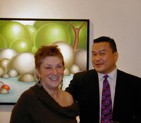Artist: Gallery Event Photos, Title: Artist representative Bonnie Perry with collector Harvey Locke - click for larger image