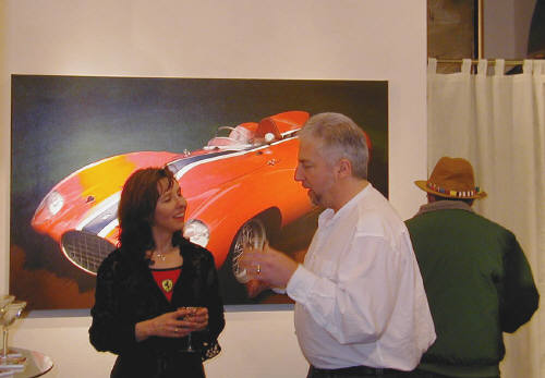 Artist: Gallery Event Photos, Title: Gallery Framer Craig Salathe telling The Ferrari Girl about his own Ferrari - click for larger image