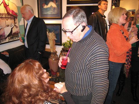 Artist: Gallery Event Photos, Title: Kenneth Behm trying to make nice with our lovely redhead - click for larger image