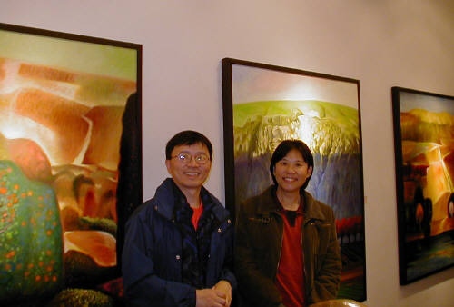 Artist: Gallery Event Photos, Title: Liang Wei collector and artist's wife enjoying the evening - click for larger image