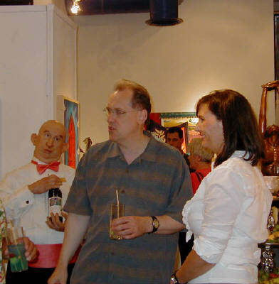Artist: Gallery Event Photos, Title: Sept 2005- Collector Kenneth Wahlin discusses a painting with artist Holly Martz...Just buy it Kenneth! - click for larger image