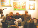 Gallery Event Photos - Sept 2005- Artists always find each other...Susie Webster visits with Gallery artists, Ray Pelley and Bill Braun
